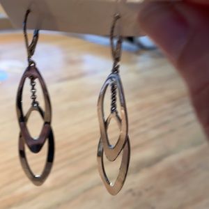 Modern, gorgeous Nine West silver earrings 2.5”